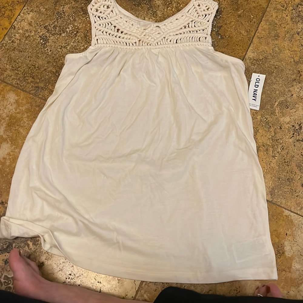 Cream brand new  shirt and crocheted at the top